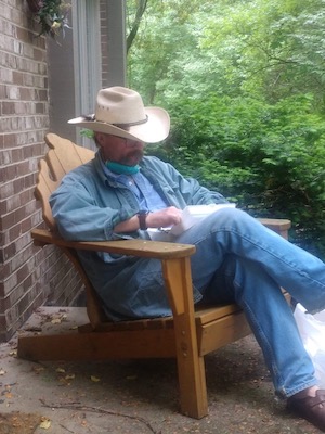 Russ Mason sitting in a chair outdoors